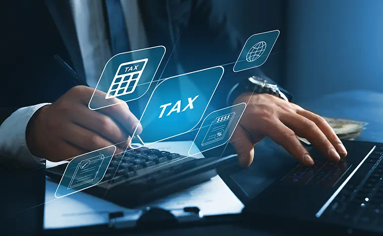 Property Management Services Taxes A person looking through his laptop with images of taxes and calculators floating.